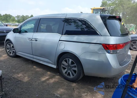 2014 Honda Odyssey Touring/Touring Elite z USA, uszkodzony, nr VIN 5FNRL5H97EB054158